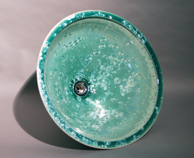 Round turquoise hand made vessel sink with lip, Front view